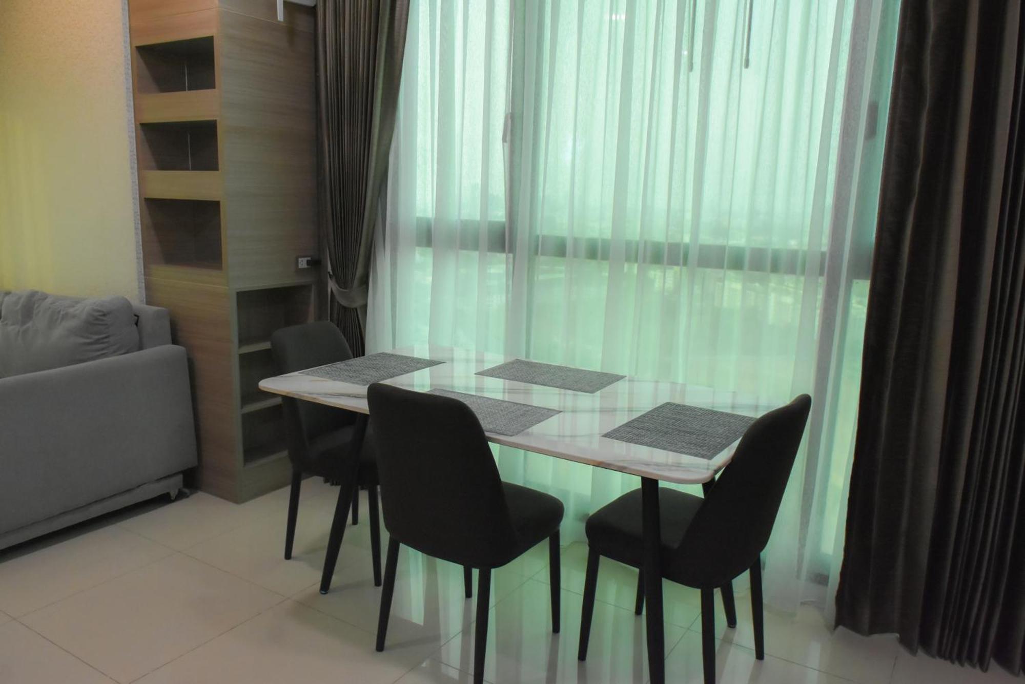 Dusit Grand Condo View Джомтьен Номер фото